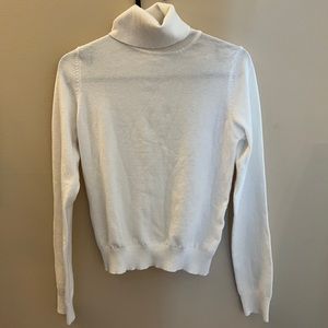 White turtleneck from Simons